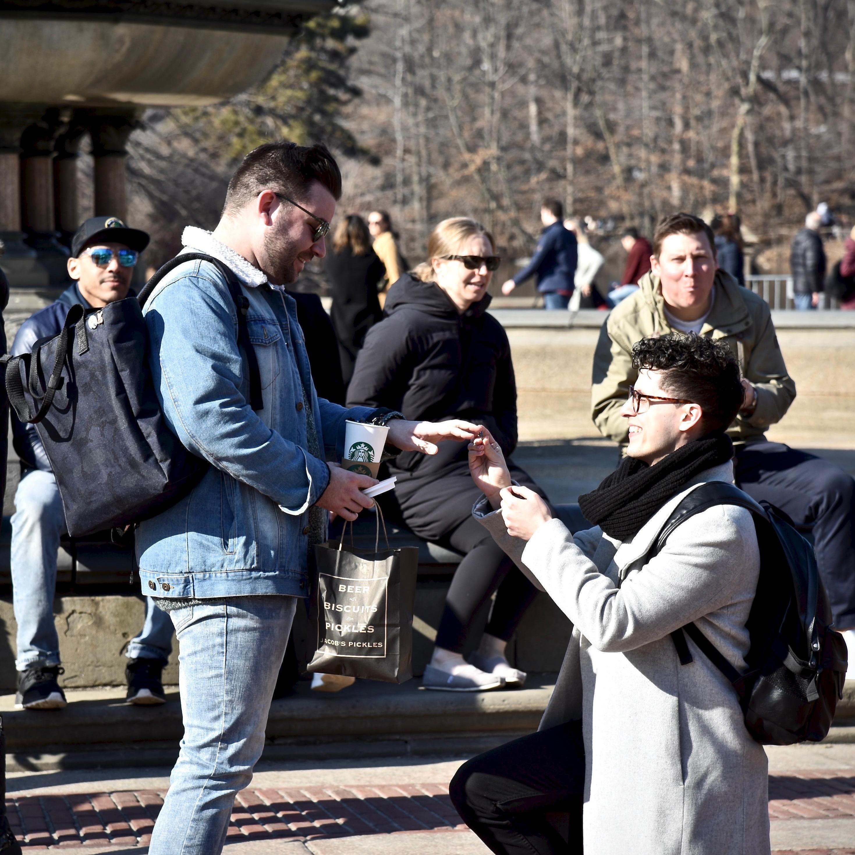 Josh on one knee, popping the big question at Bethesda Fountain in Central Park.
Taken in March 2019 by our friend Kat, who Candid Camera'd this moment.