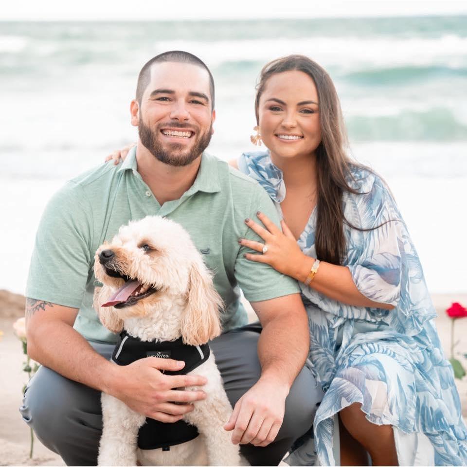 The day we got engaged! Of course our adorable golden doodle, Swayze was the star of the show!
