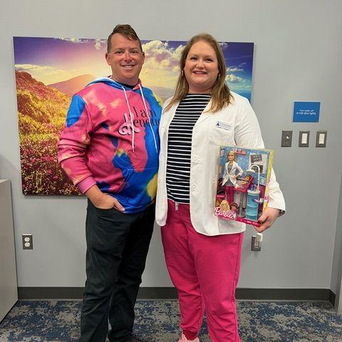Amanda's office dressed up for Halloween as different Barbies. Brian came into the office at the end of the day to take group photo for us and joined in with an "I am Ken-ough" sweatshirt.