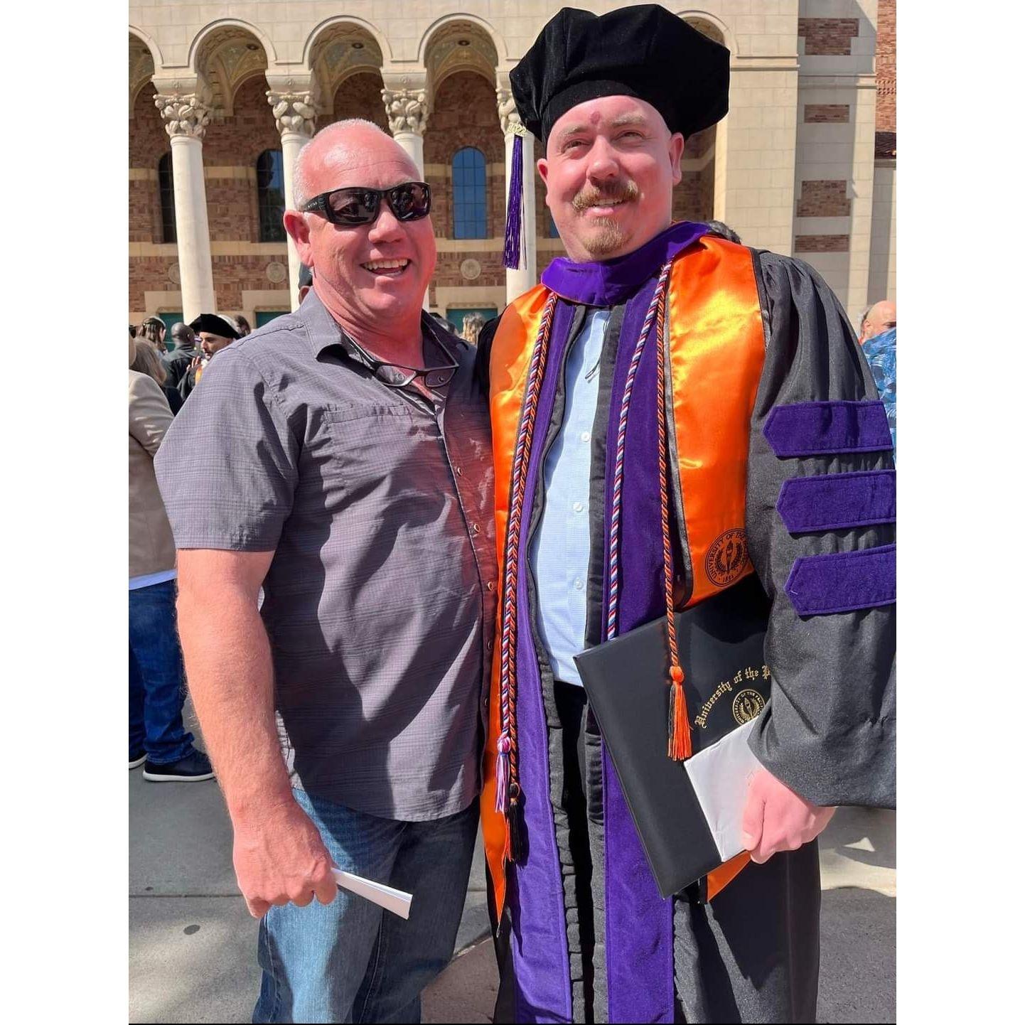 Robby's dad and brother (graduating from Law School)
