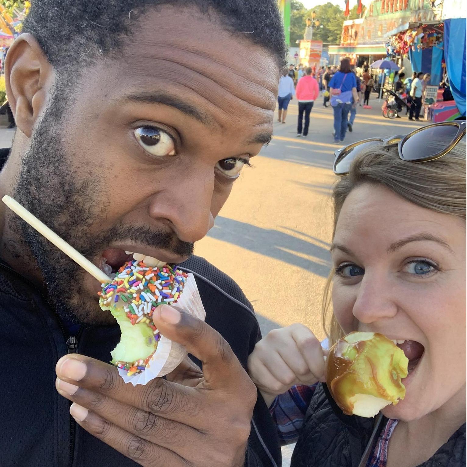 Enjoying caramel apples at the NC State Fair