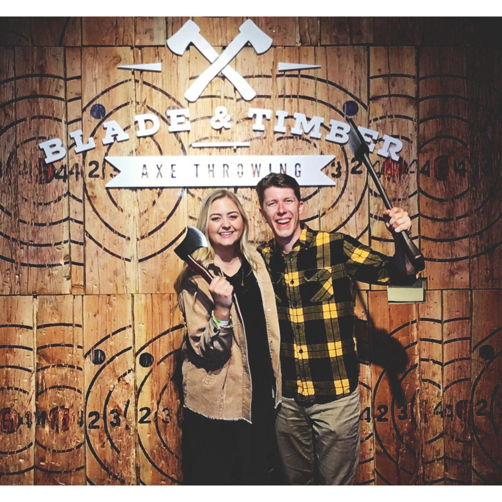 Throwing axes with Nate's fraternity brothers to celebrate his birthday.