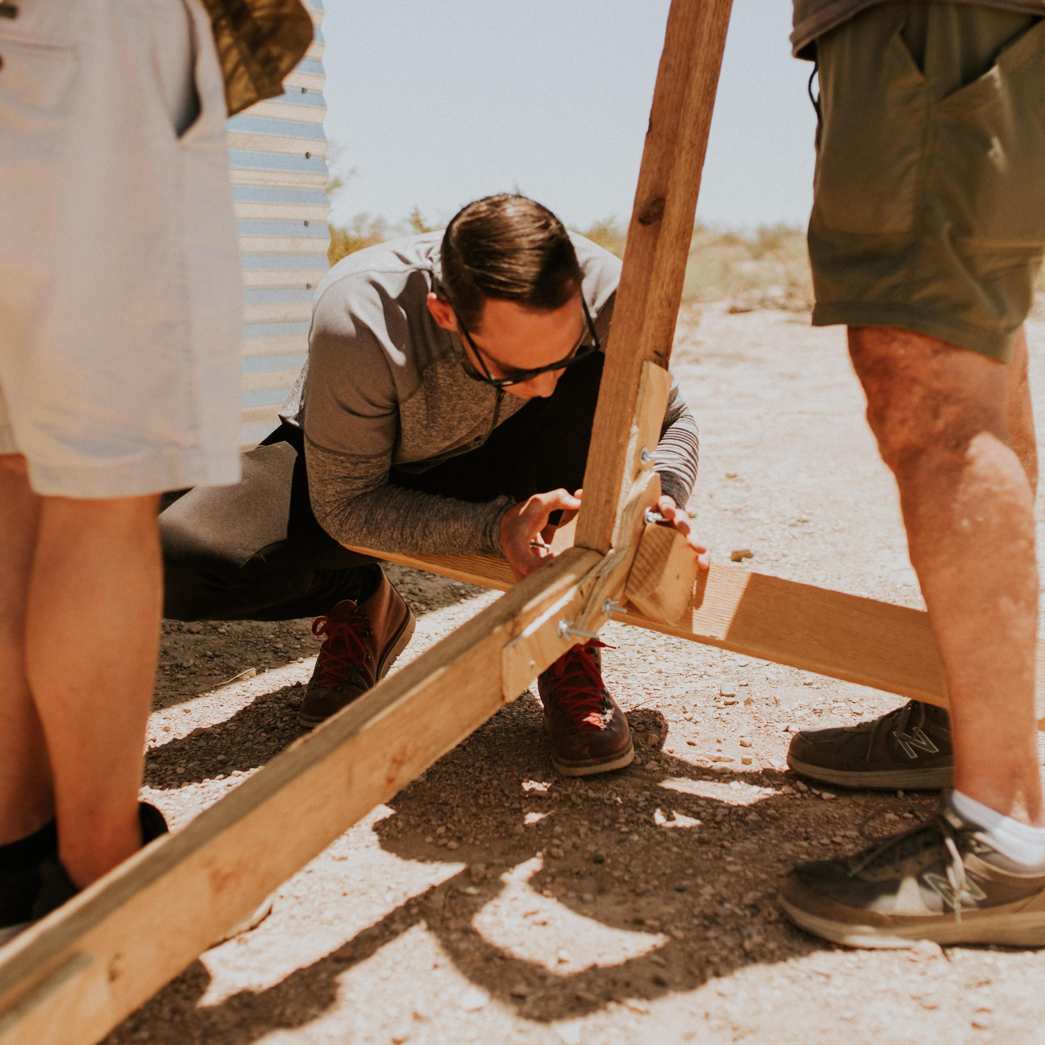 Gavin, Dad, and Jeremy setting up the wedding arch that Gavin made at the campsite we rented (for $25!)