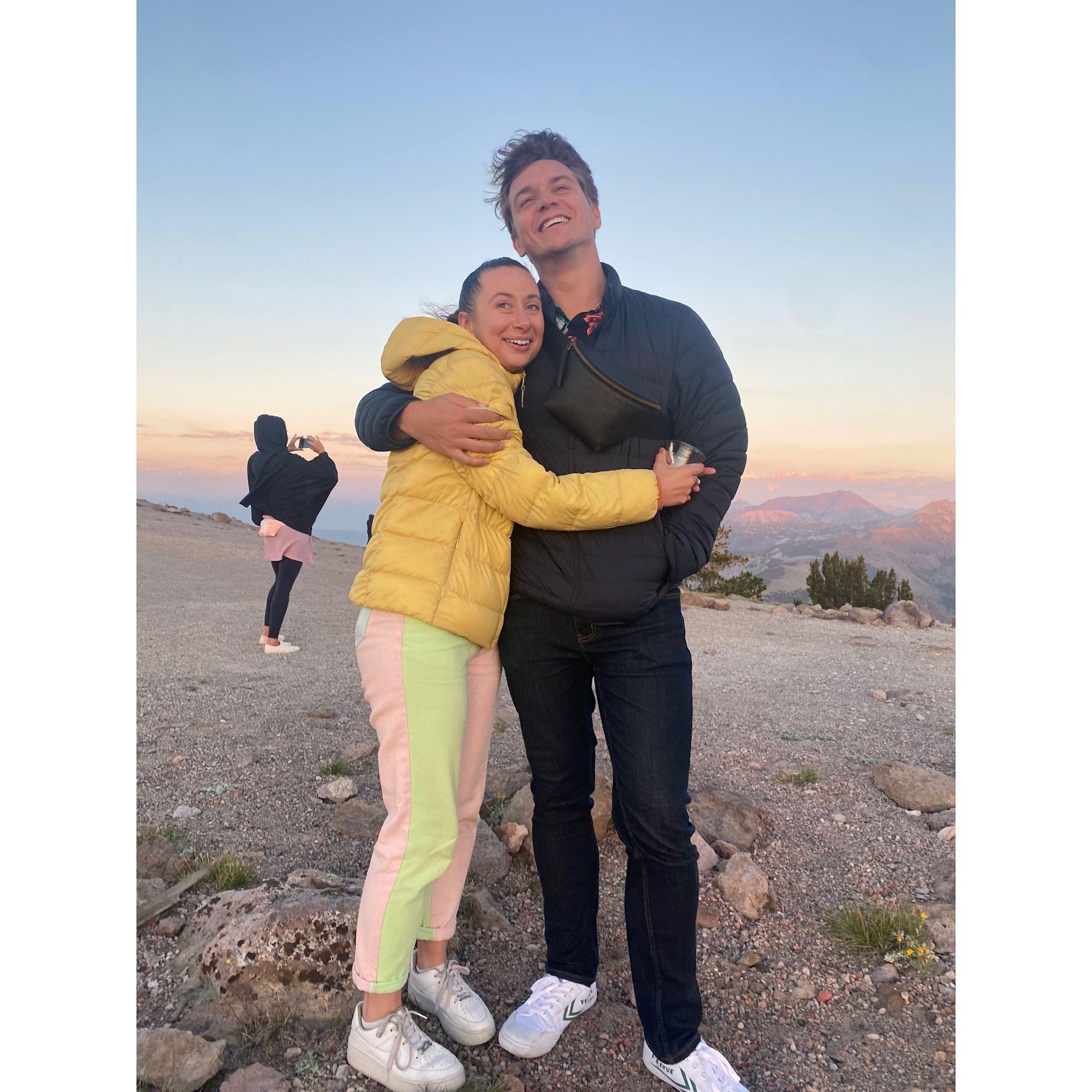 Victoria & Leo at the top of a mountain in Mammoth, CA for sunset, circa 2022.