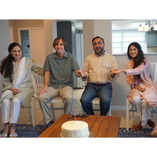 Mohsina's parents, Qazi Mahmood Ulhaq and Mahwash Mahmood sitting with Dalton and Mohsina.