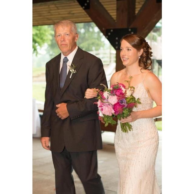 Sarah and her father, Lee, coming down the aisle