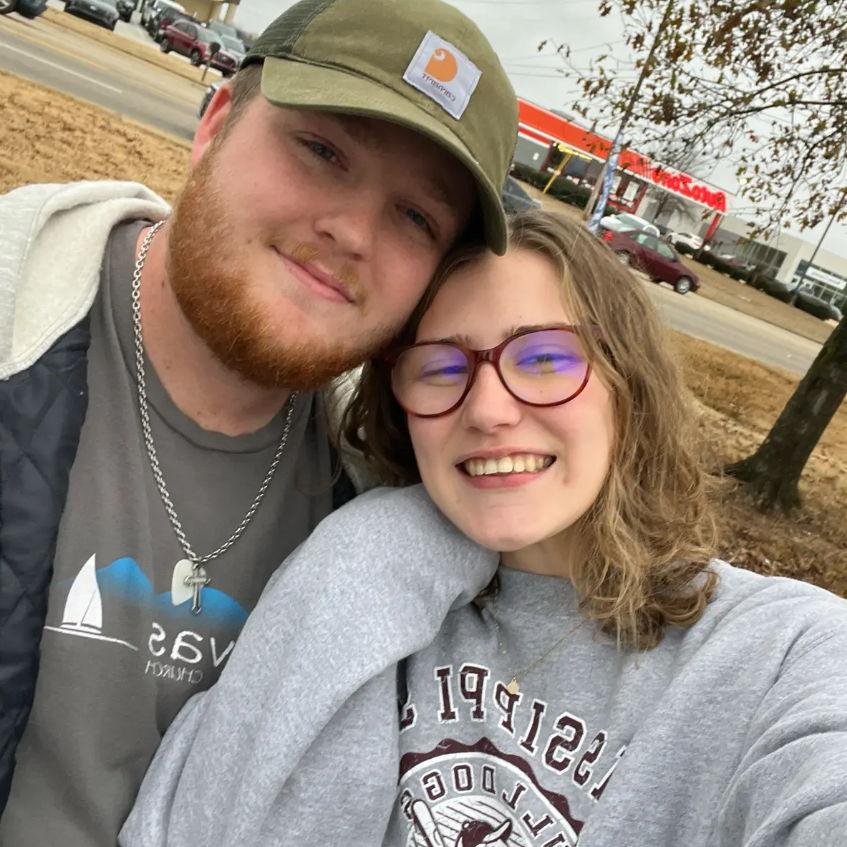 Our first photo together as a couple.