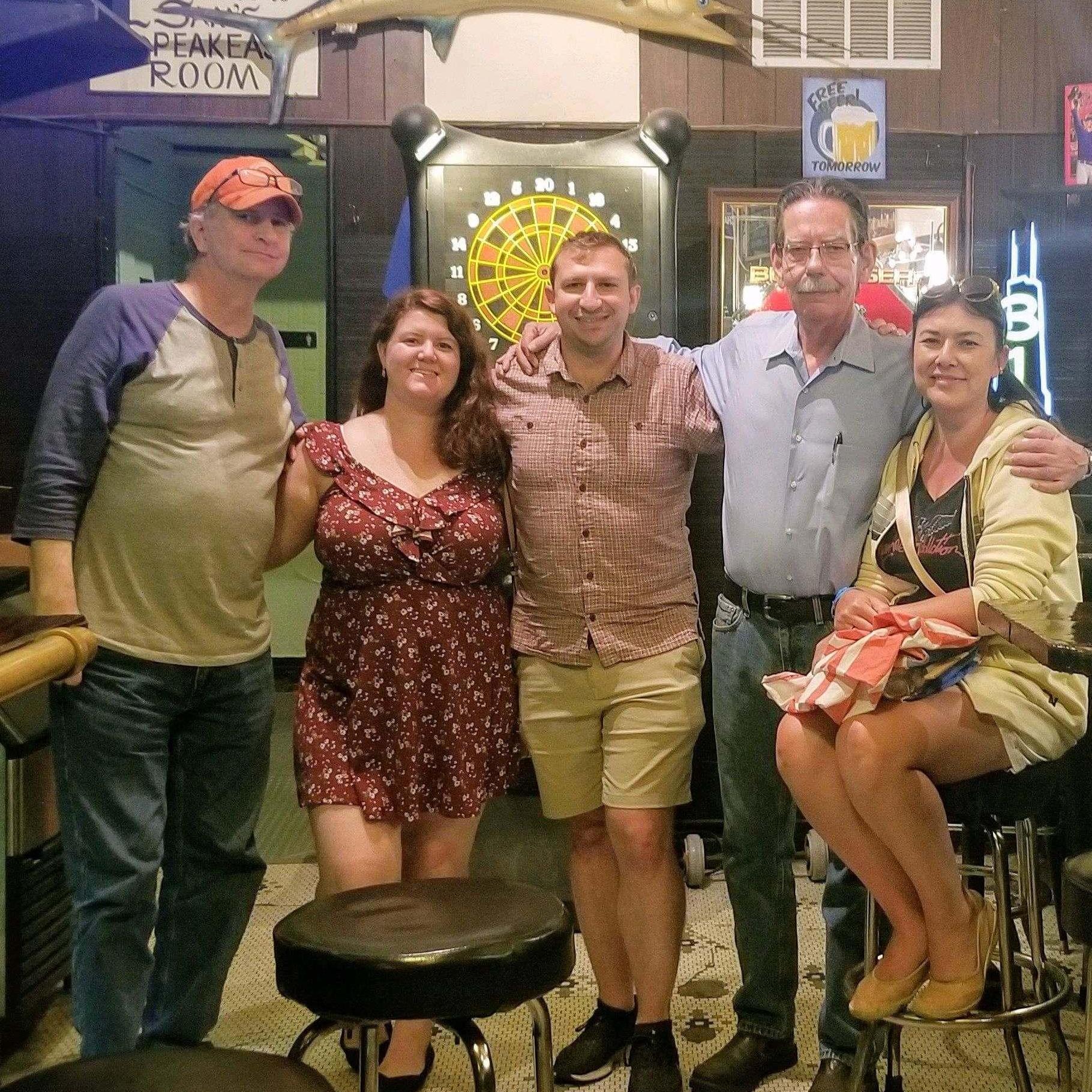 Our first photo together, with our beloved bartender Jack. Summer 2021