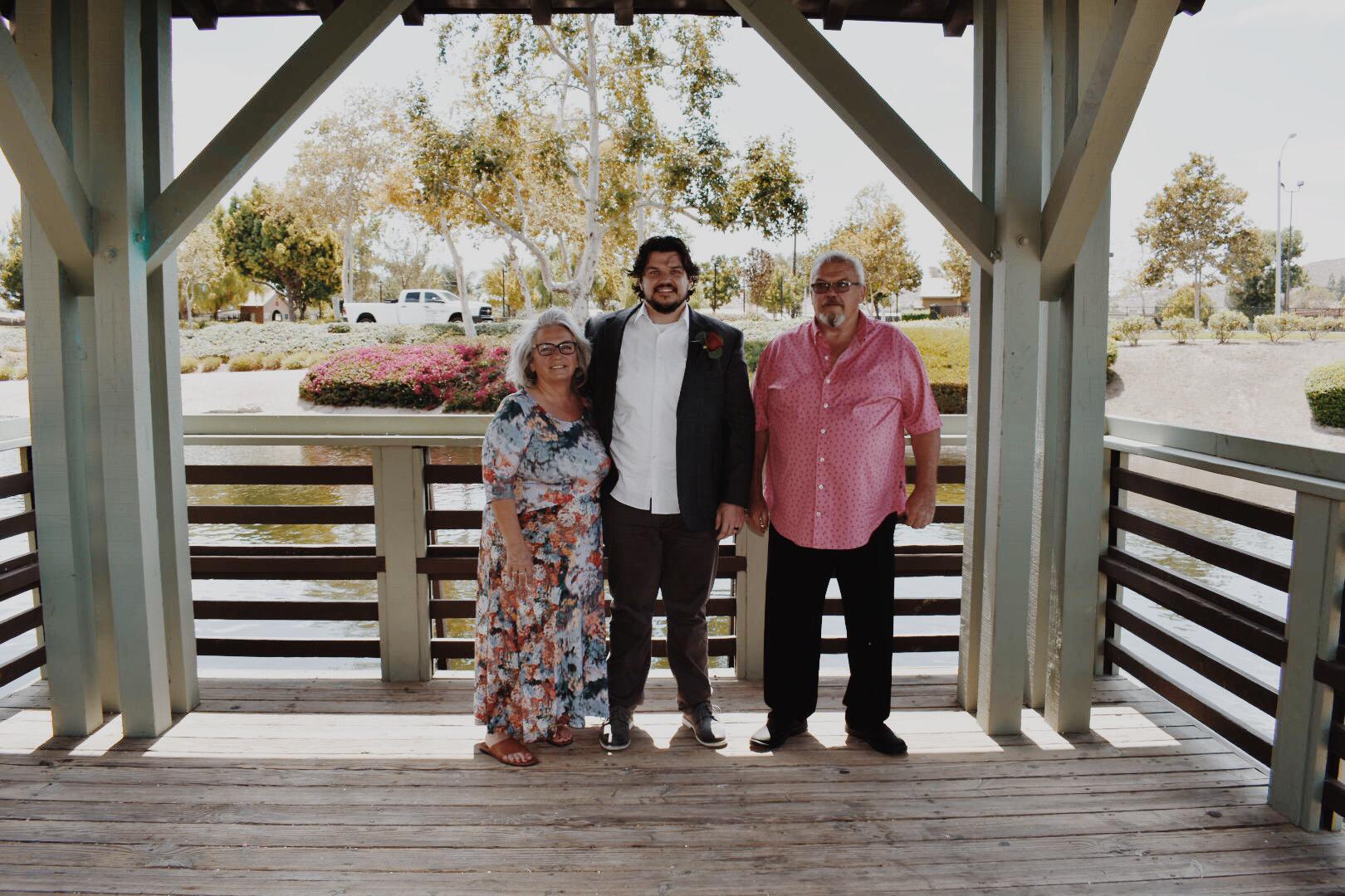 Ian with his parents Bernice and Scott Clark
