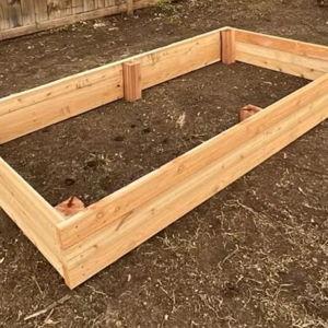 Wood & Soil for Homemade Garden Bed