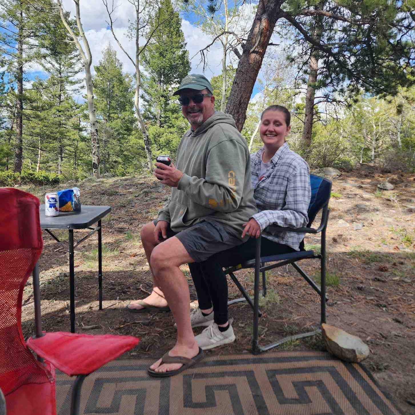 A family camping trip! Hannah makes a comfortable chair.