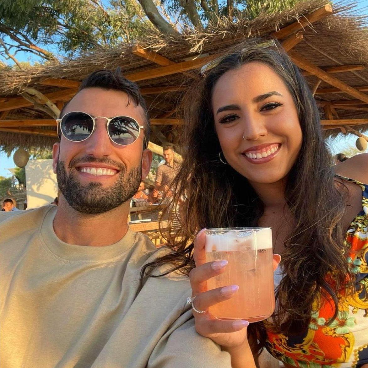 Enjoying some cocktails as a newly-engaged couple in Mykonos, August 2022
