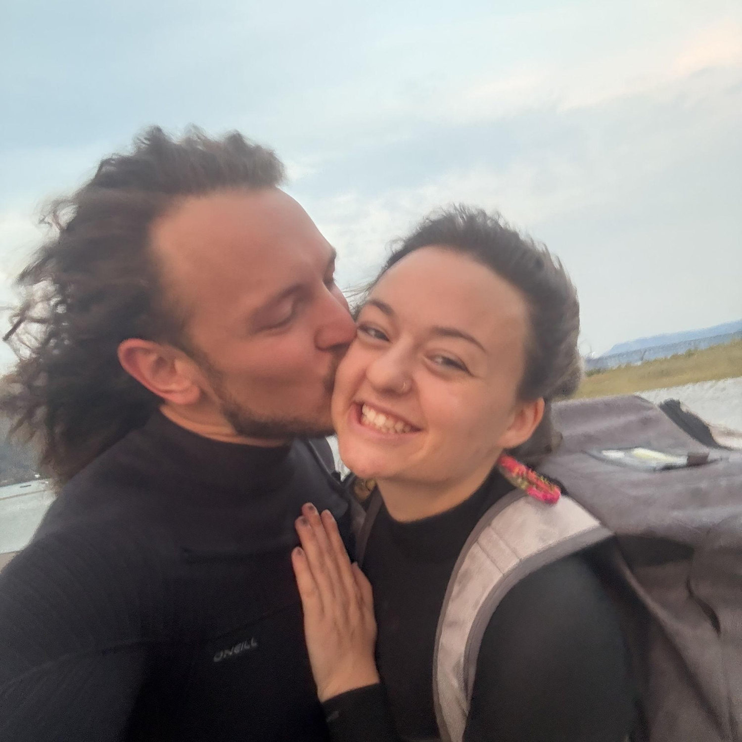 Kevin showing Alyssa how to kitesurf