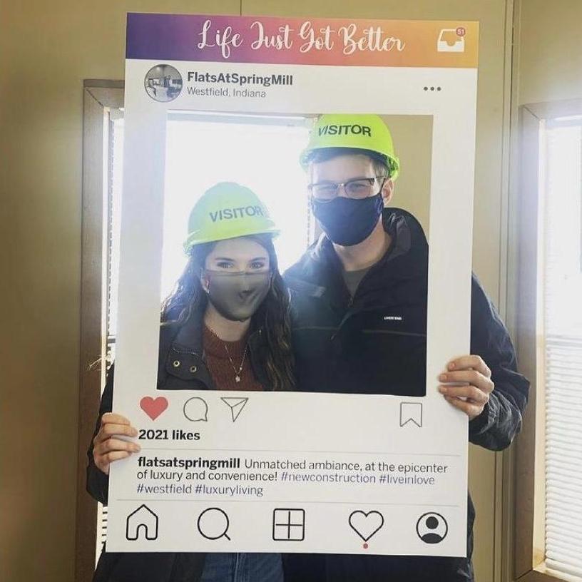 While wearing hard hats in a construction zone, we signed the lease for our first apartment together!
