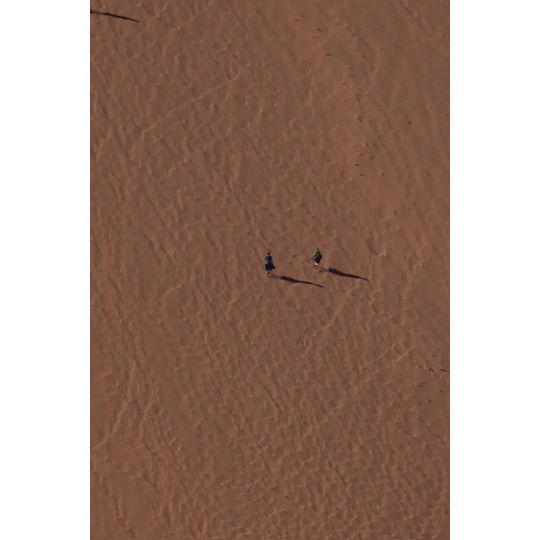 Running down Big Daddy Dune in Namibia