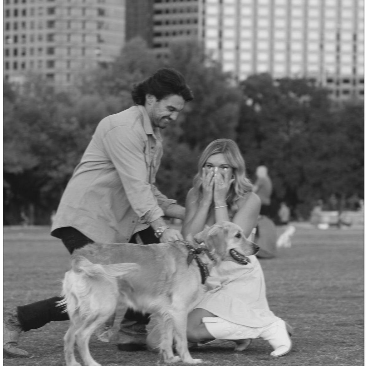 All was fine and dandy until Connor panicked saying Dolly had something stuck in her mouth. As Taylor came over to help with Dolly, Connor got on one knee...