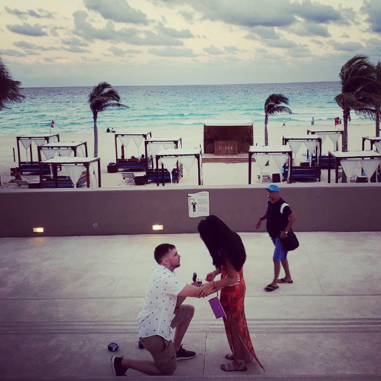 Craig proposed in Cancun with my favorite backdrop; the beach, palm trees, & the sun!