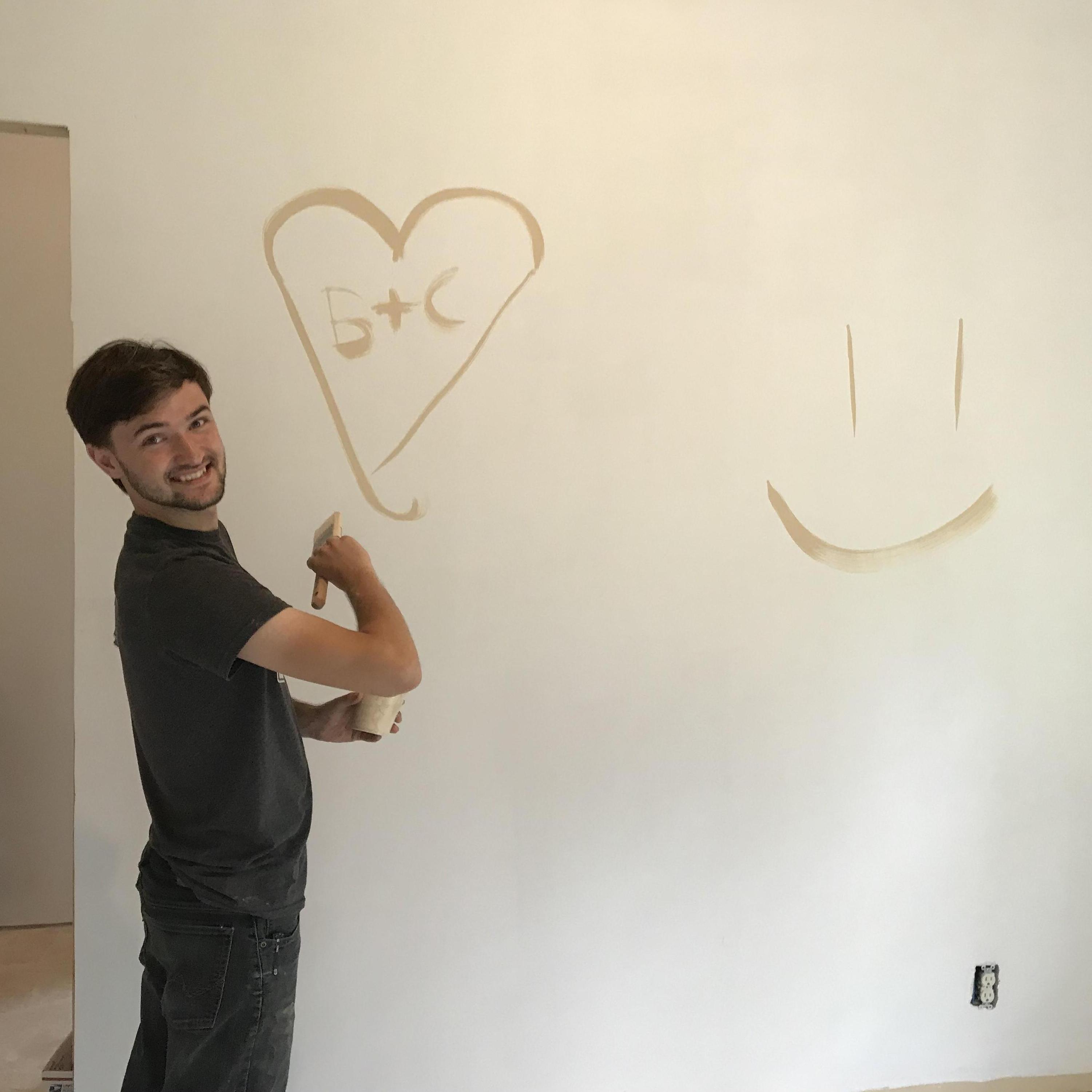 Painting the walls of Ben's house. (7-25-20)