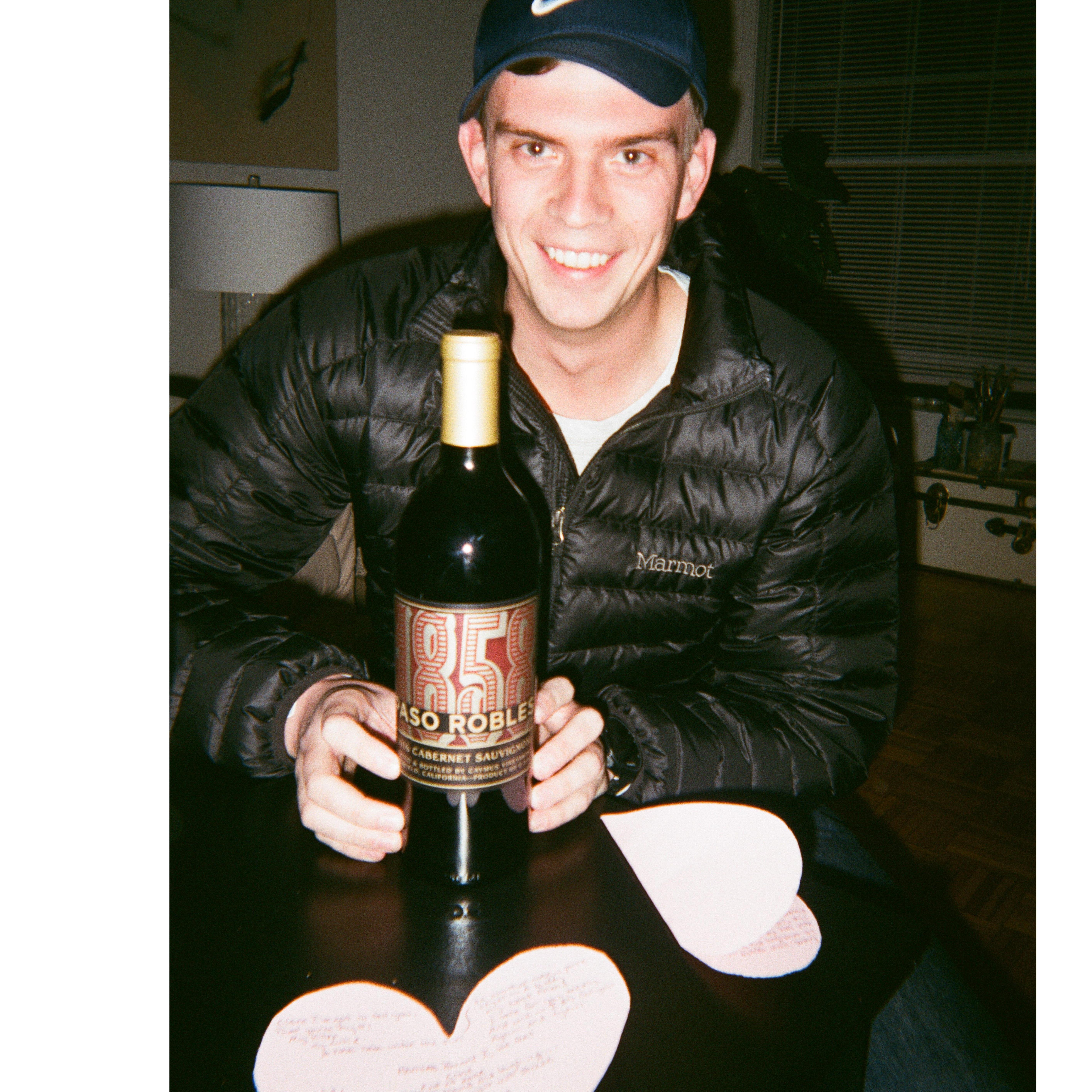 a valentines day surprise with poems written on paper hearts and wine before dinner :)