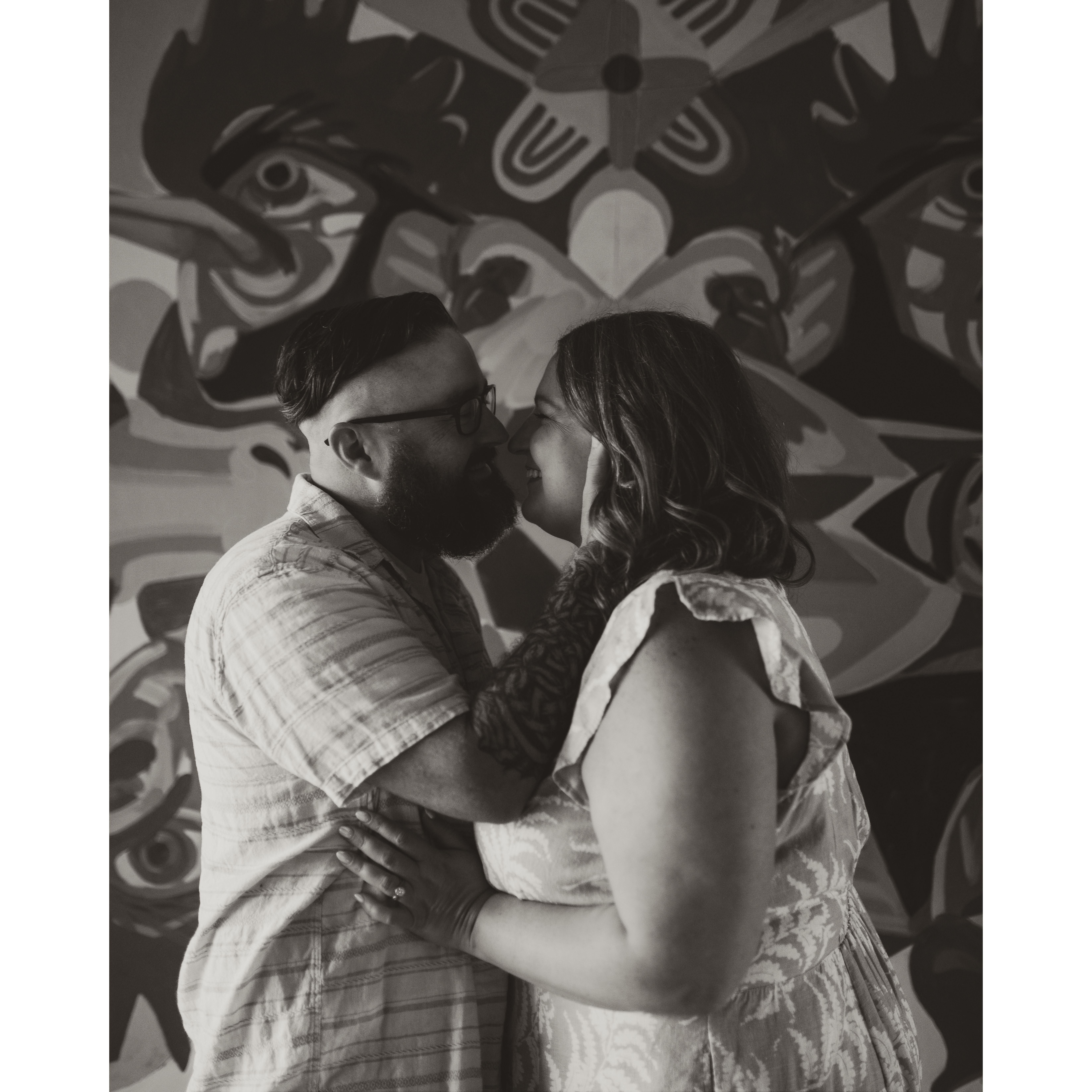 Our first kiss was in front of this mural, so we had to get our engagement photos done here.