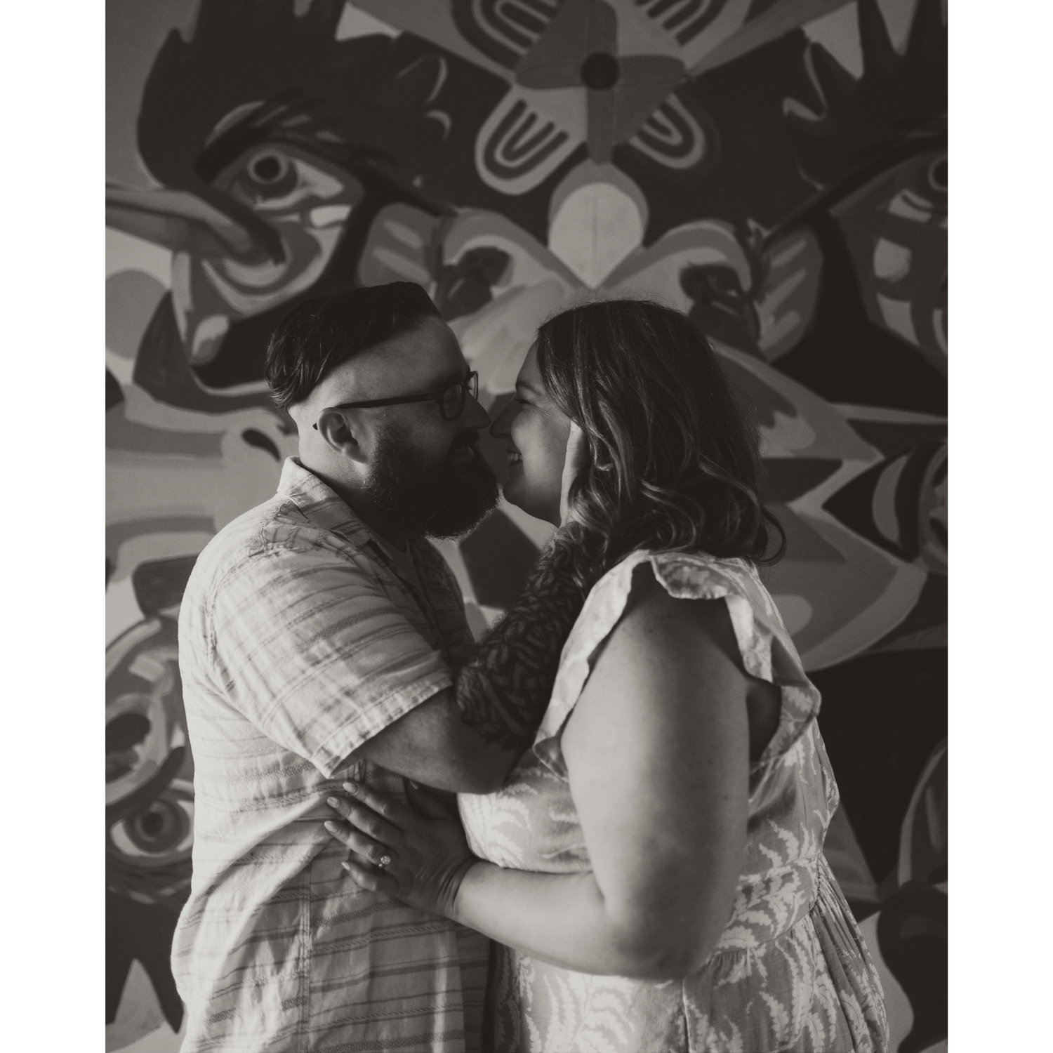 Our first kiss was in front of this mural, so we had to get our engagement photos done here.