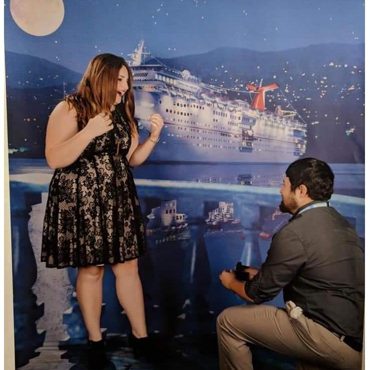 The moment he popped the question. He did it in front of a photographer on our first cruise together so that we could have this moment caught on camera forever.