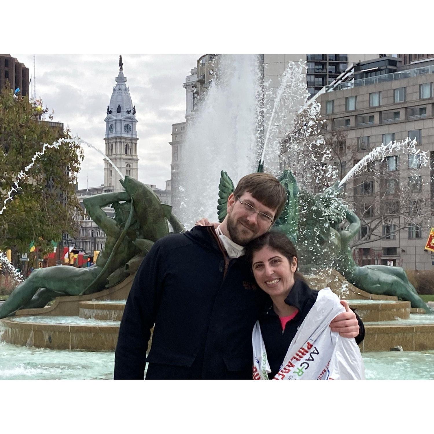 A kind passerby took this photo of us after Sarah finished the 2021 Philadelphia Marathon!