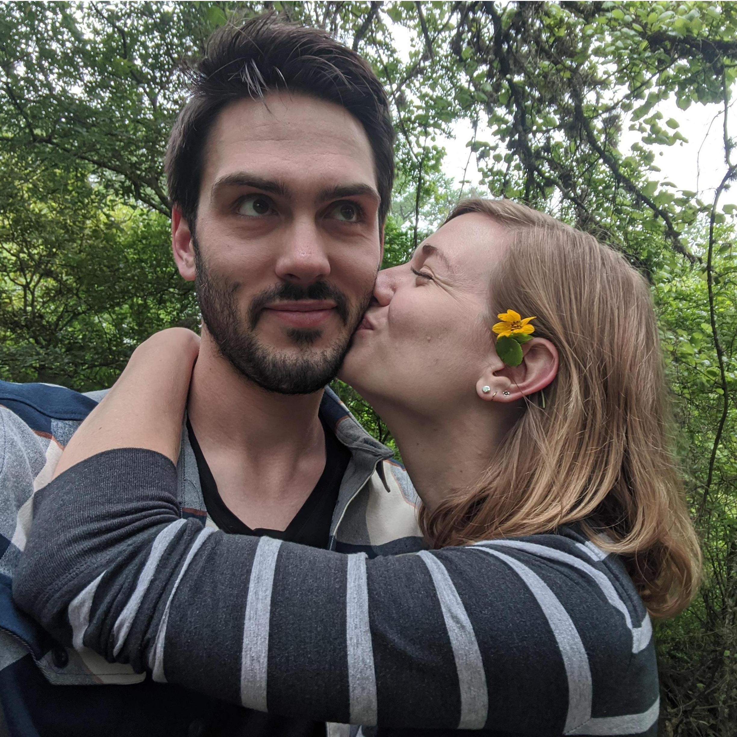 She "made" him take this picture. (He likes it)