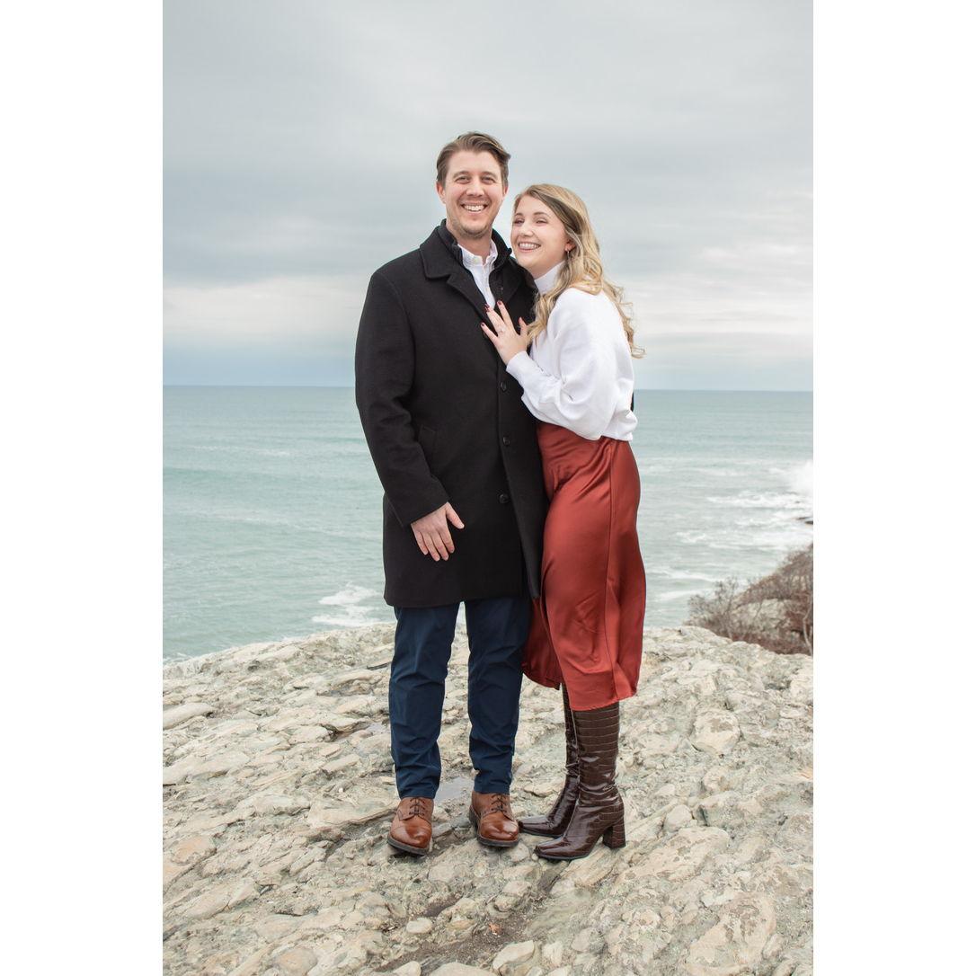 He proposed! After a lunch date at their favorite spot, The Chanler at Cliff Walk, Zach proposed on the cliffs overlooking Sachuest Bay in Newport, RI.