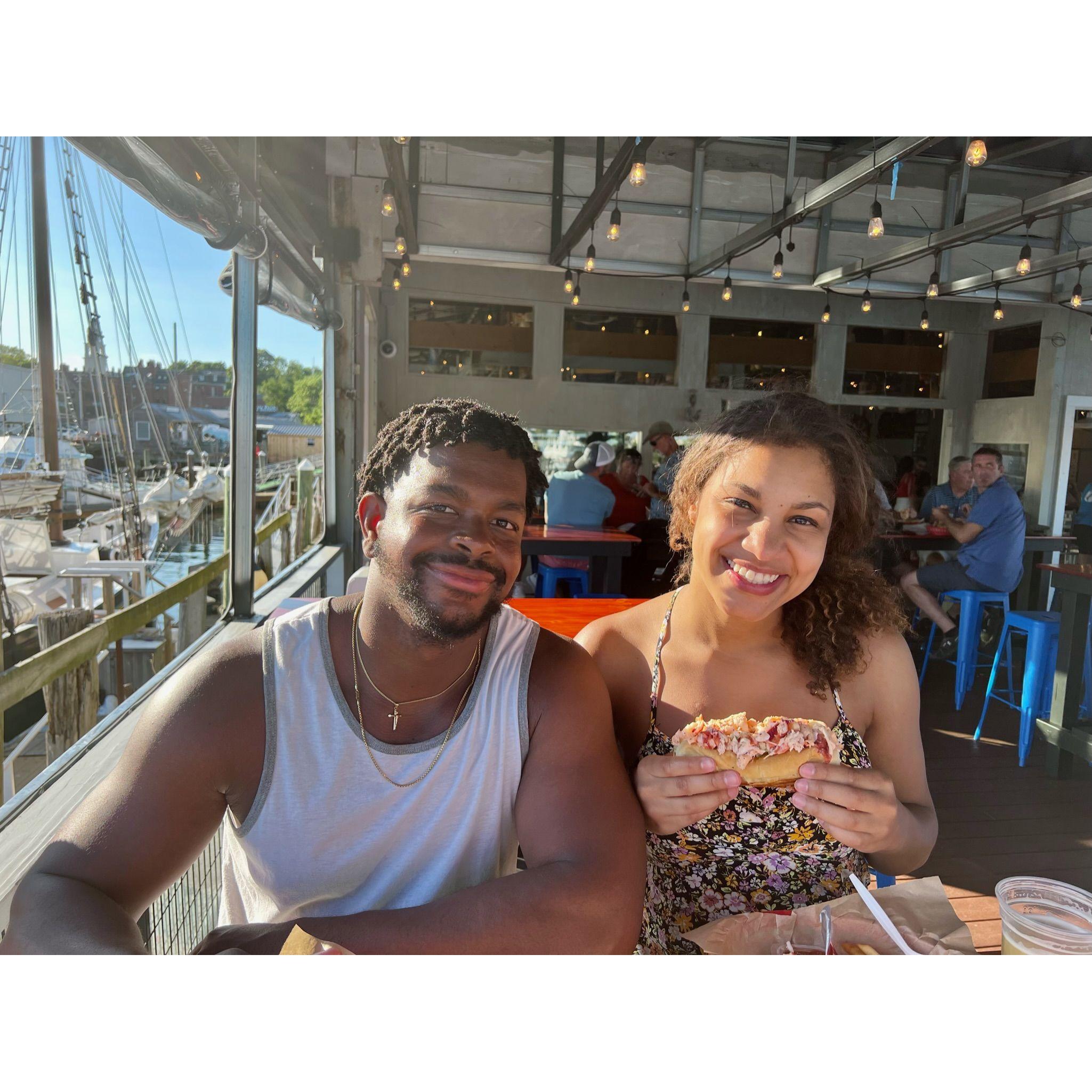 Enjoying one of our favorite New England classics - a lobster roll, after a day at the beach.
