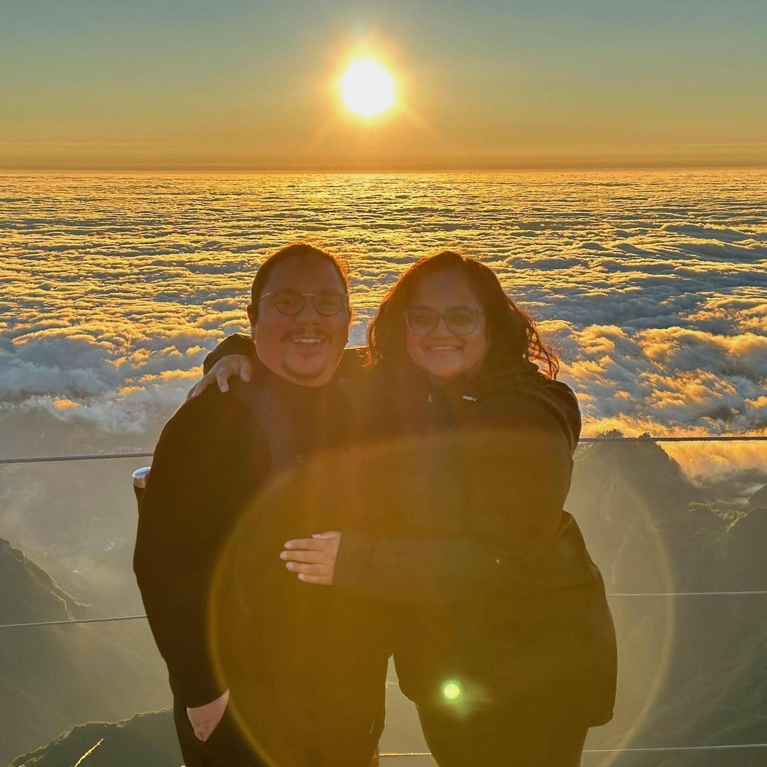 "Now that we're engaged, you want to climb a mountain and look down at the clouds?" "Uh... sure?"