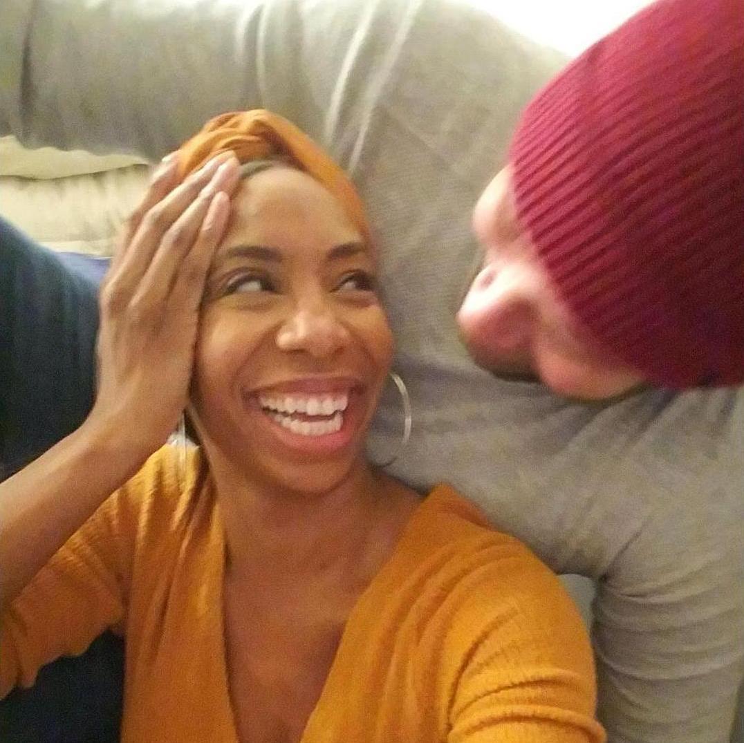 Our first house warming. There were literally boxes around us but at least we had a couch!