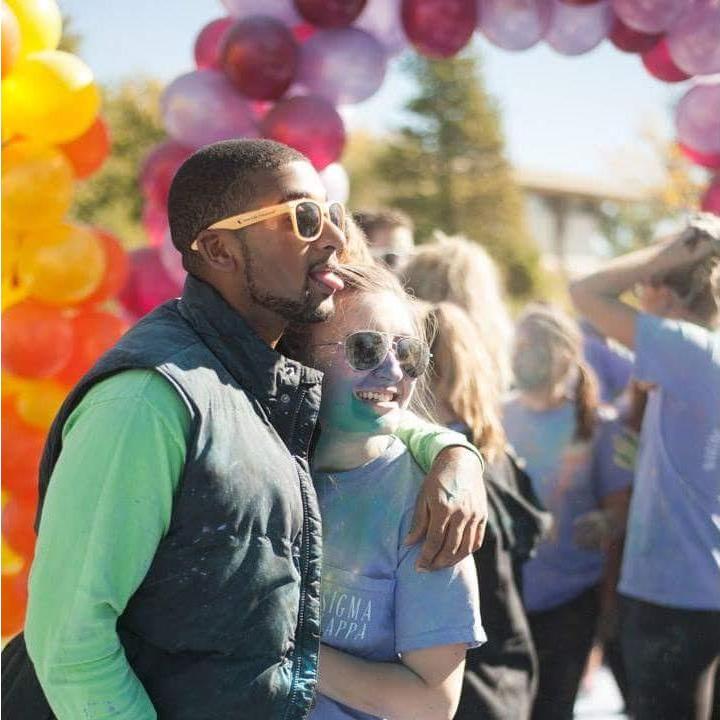 Our first photo together was snapped by one of my sorority sisters right after a color run put on by my sorority. The smiles and laughs haven't stopped since!!