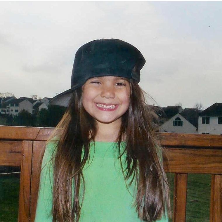 Young Amanda hanging out on her back deck!