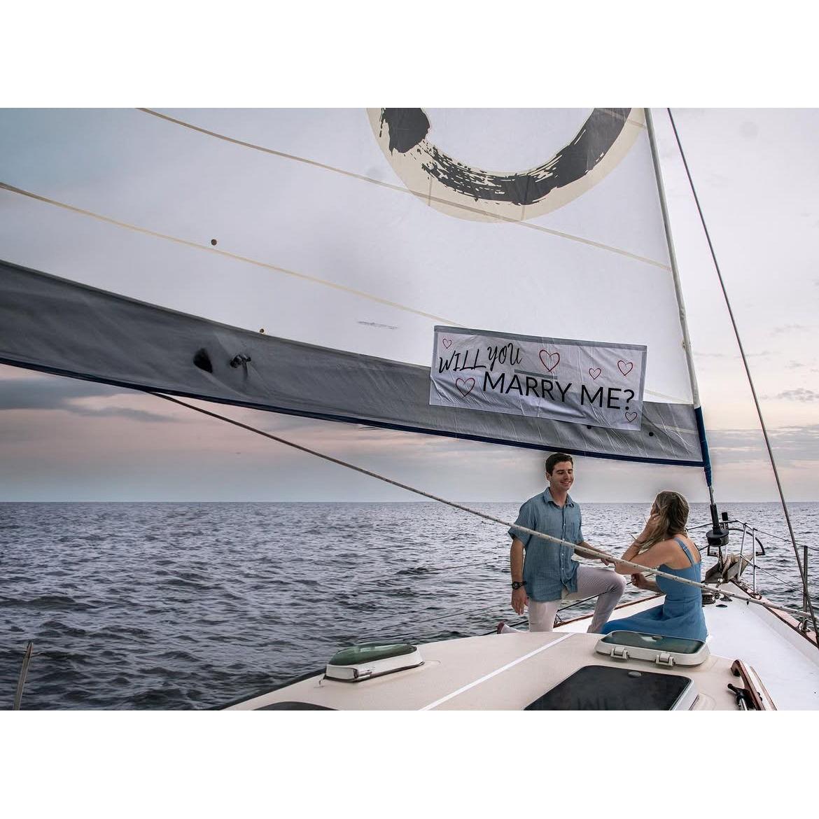 Noah proposed to Jillian in St. Petersburg, FL in a sailboat!