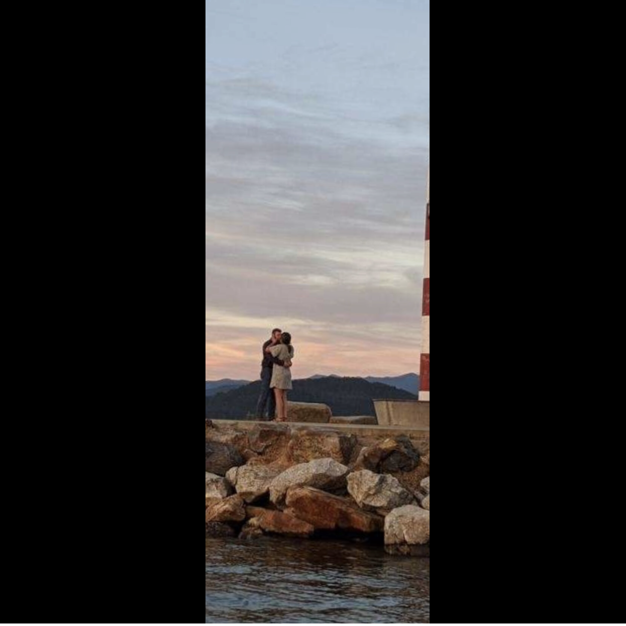 A local in Idaho snapped this photo during our proposal from his fishing boat