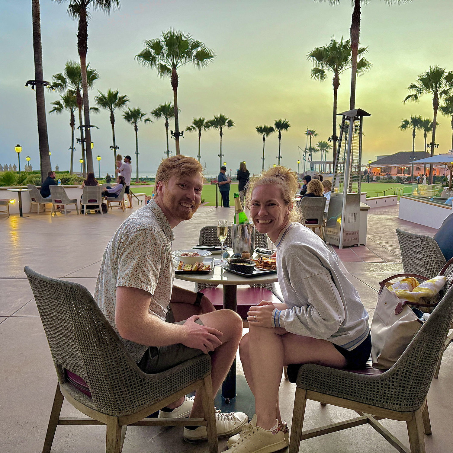 Drinking champagne at the Hotel Del Coronado right after we got engaged!
Please note: Carson's Buckee's swim trunks hidden in Katie's purse. Integral part of our love story