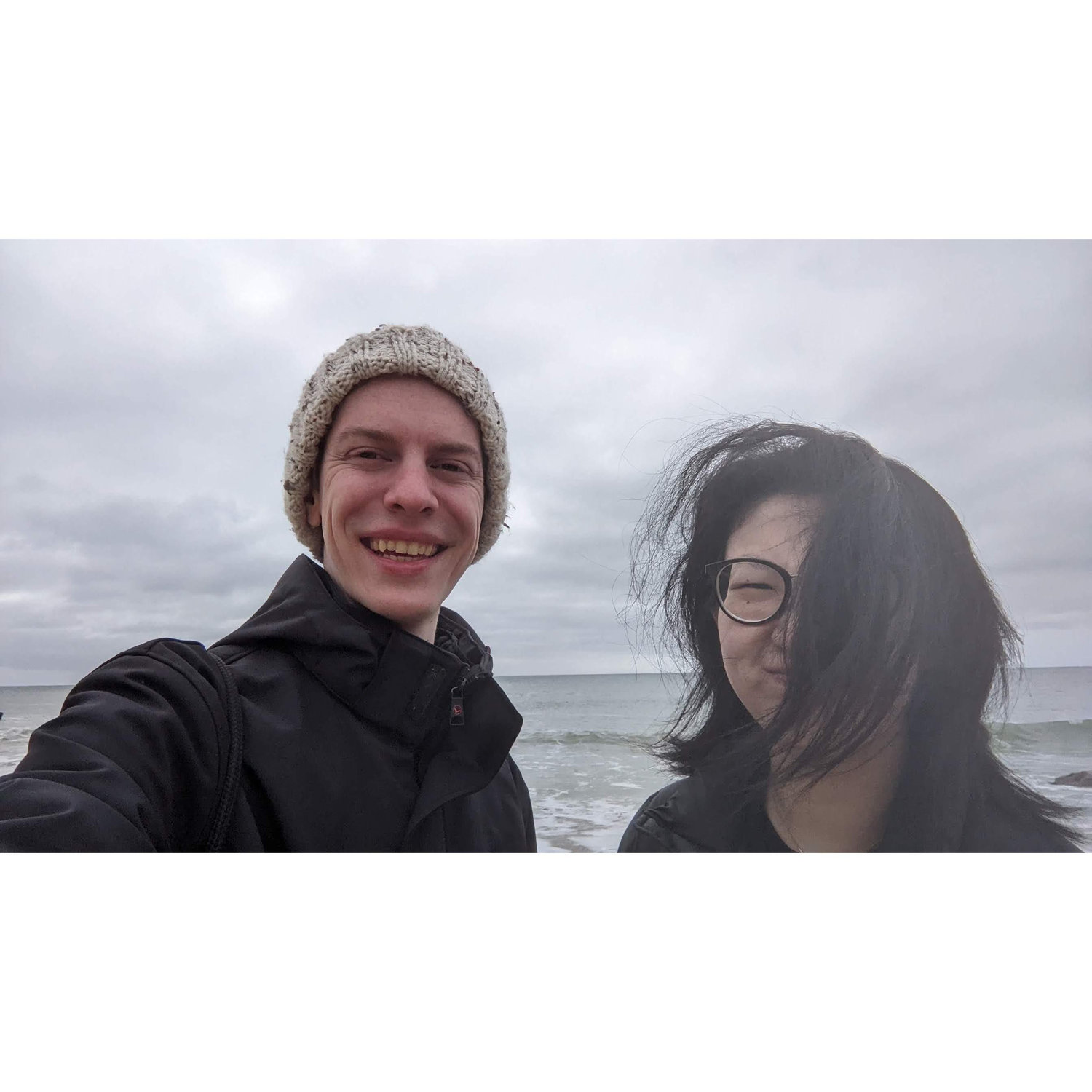 This was taken not long after Karen accepted Sam's proposal. She did not accept the weather that day. (Sunday 3/12/23, Aquinnah Cliffs Overlook.)