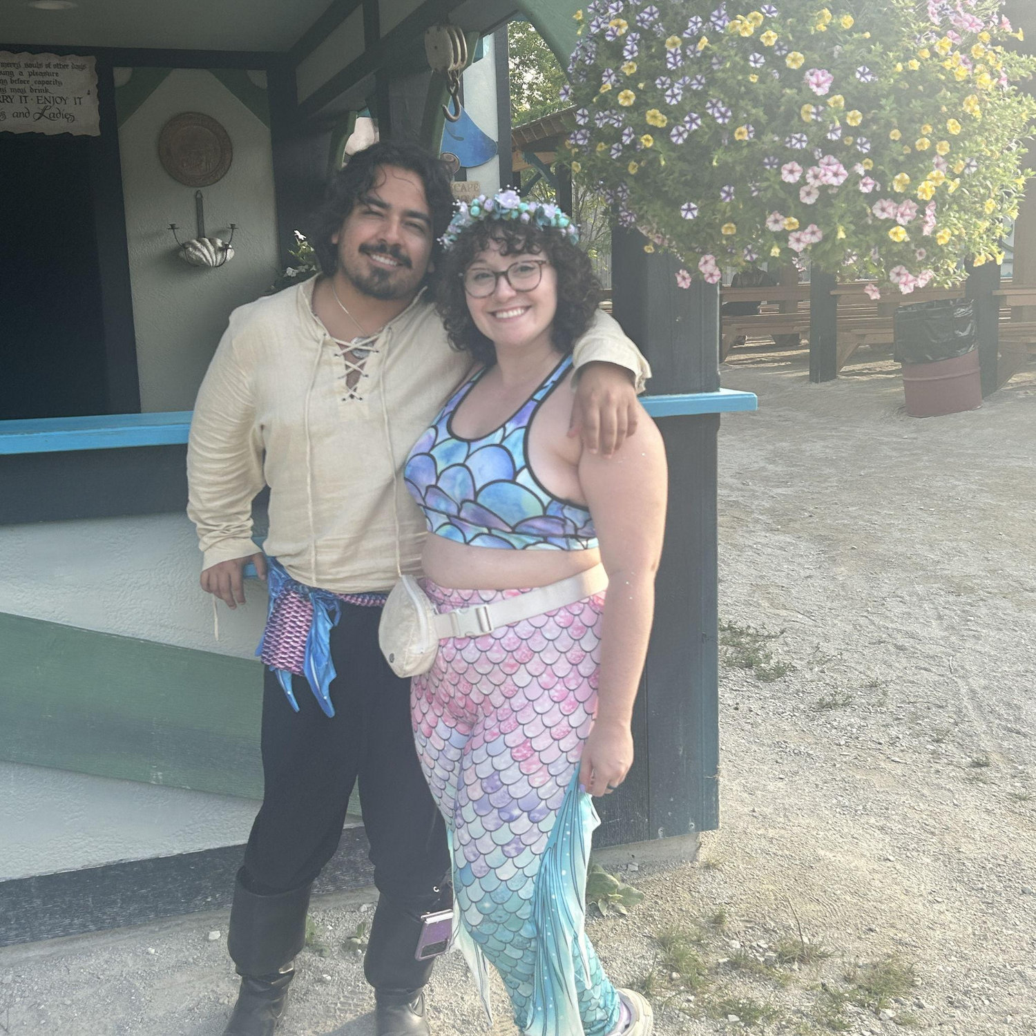 A mermaid and the mermaid hunter at the ren faire