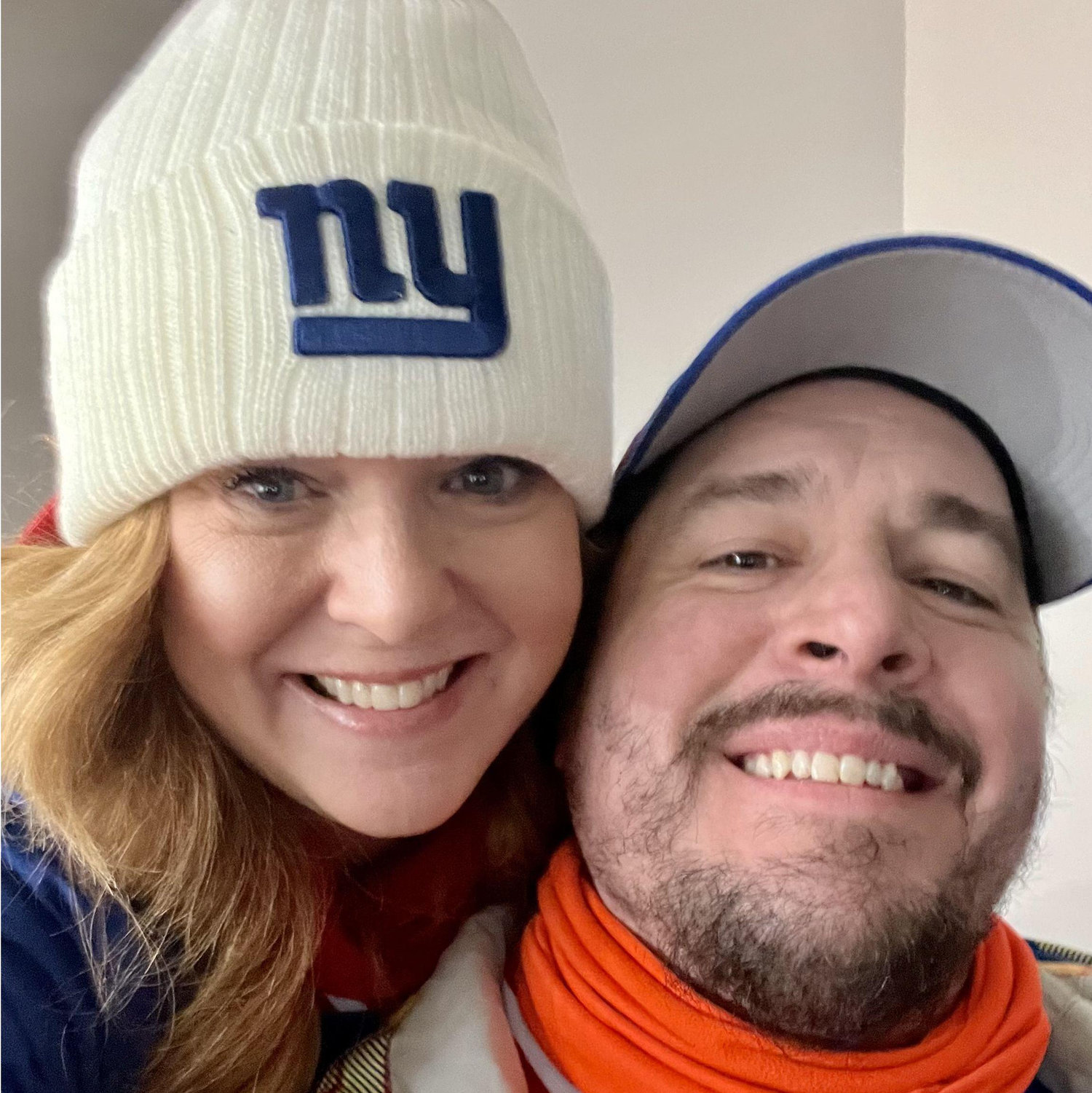 True love is wearing the team gear of your partner at their game!