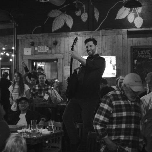 Matt playing in his band 'Outside Voices'