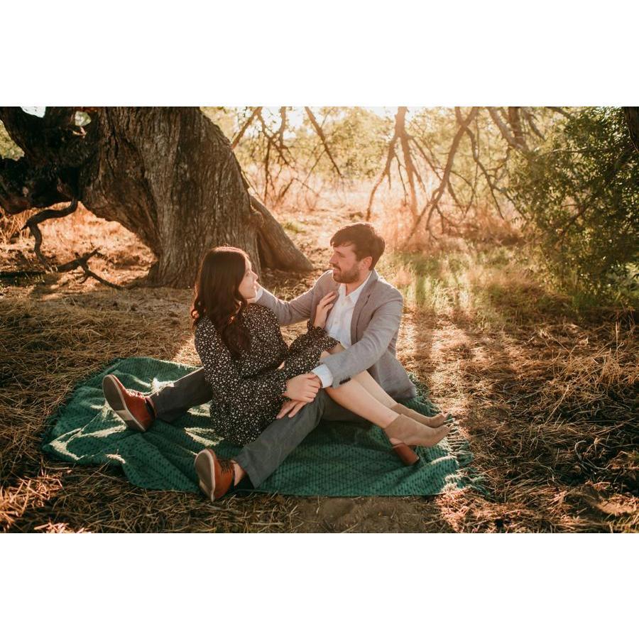 This may just look like a staged "picnic" scene, but I was actually trying to tuck Steph's hair behind her ear while telling her how beautiful she was.
- Brian