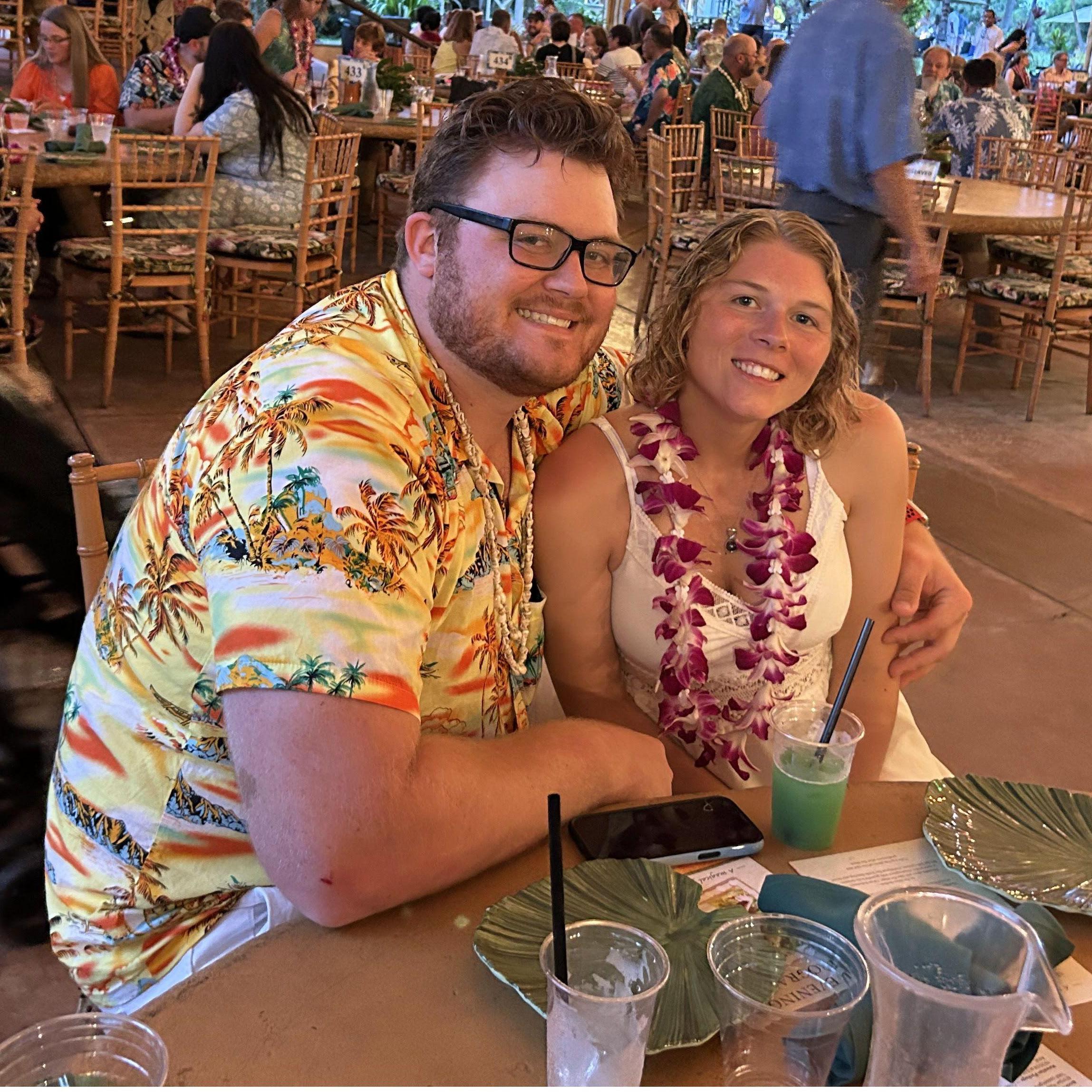 Nathan and Morgan at a luau during their Hawaii trip in 2024.