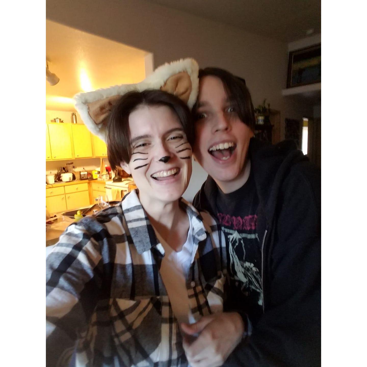 Halloween 2020 celebrated at home. Donny dressed as a cat. Vivian dressed as Donny.