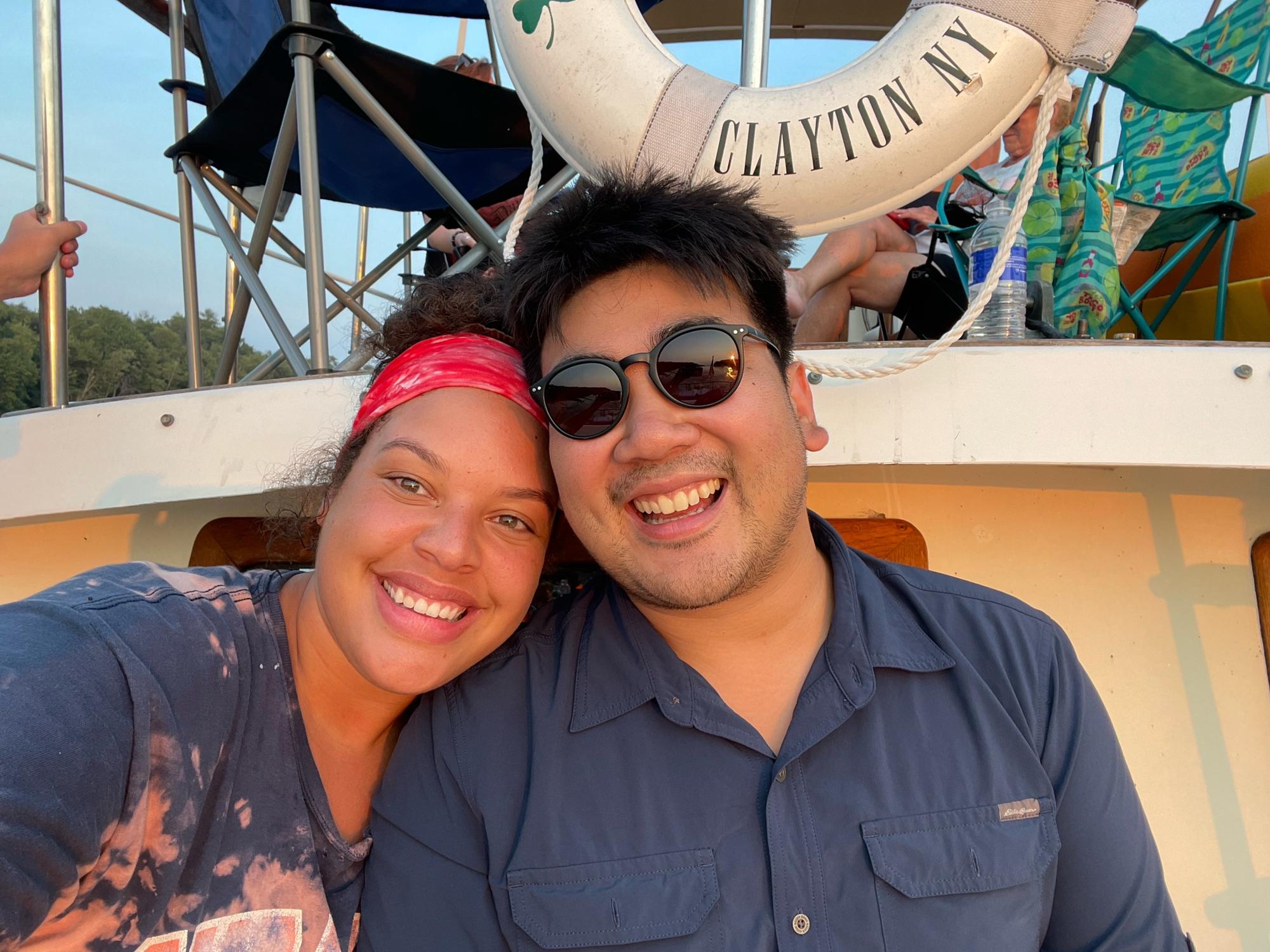 Unsuspecting smiles! Just days before we were engaged, on Taylor's Uncle & Aunt's boat!