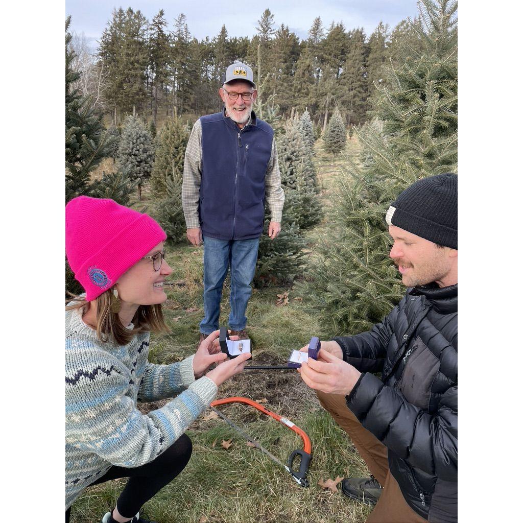 We suprised my parents while cutting down our Christmas Tree