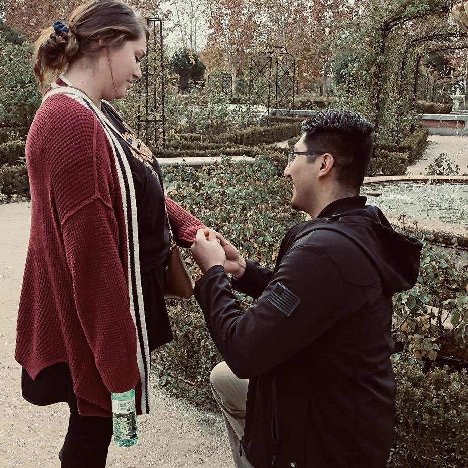 Getting engaged at the rose garden in Madrid, Spain!!