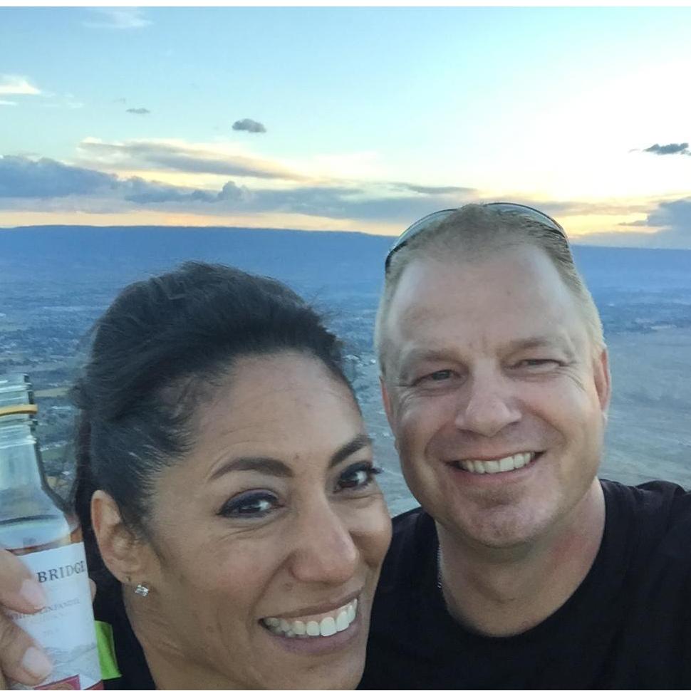 Our first kiss... and proposal ... atop Mt. Garfield. A rugged hike accending up over 1,900 feet, climbing boulders, seeing wild horses, just to view the grand valley.
And we touched the flag pole!