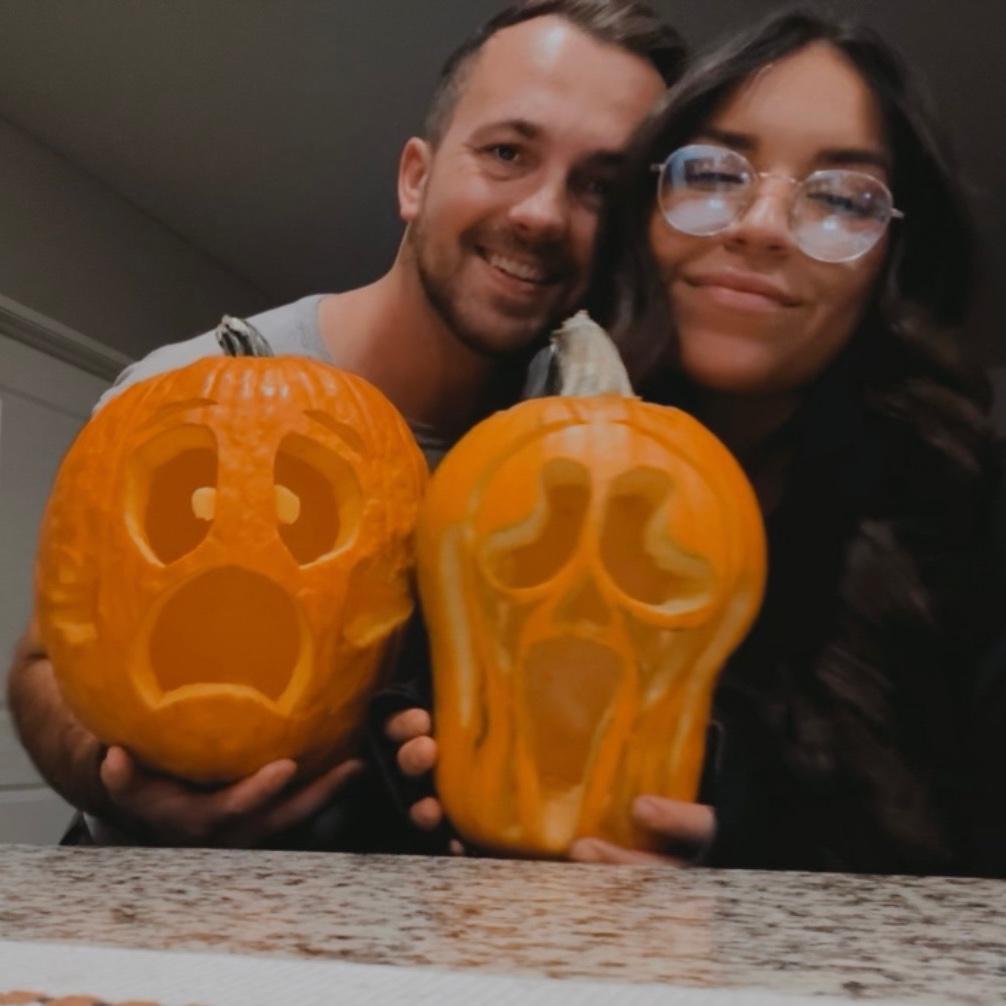 We carve pumpkins every year. We always turn our pumpkins away from each other and see who can carve the best design.