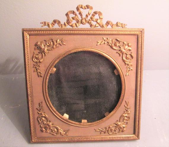 Antique French Bronze dore photo frame fabric bow louis XVI style circa 1900's photo frame.